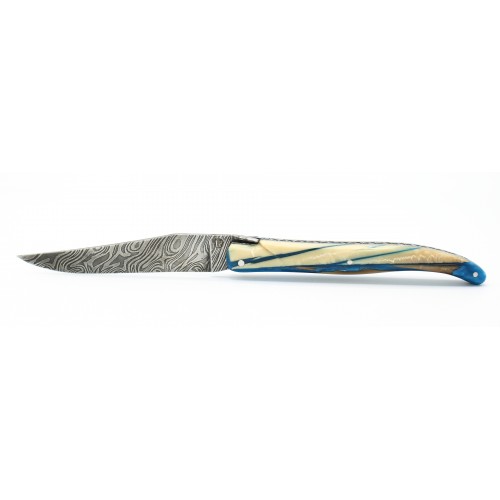 Couteau Laguiole 12cm plein en mammouth zébré incus dans résine bleue