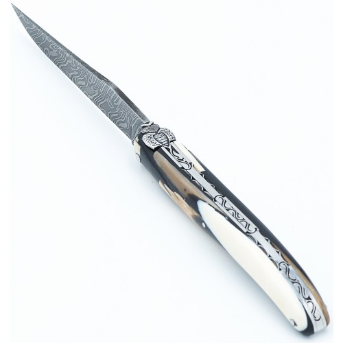 Couteau en molaire de Mammouth zébré, lame de Damas et ressort imagine